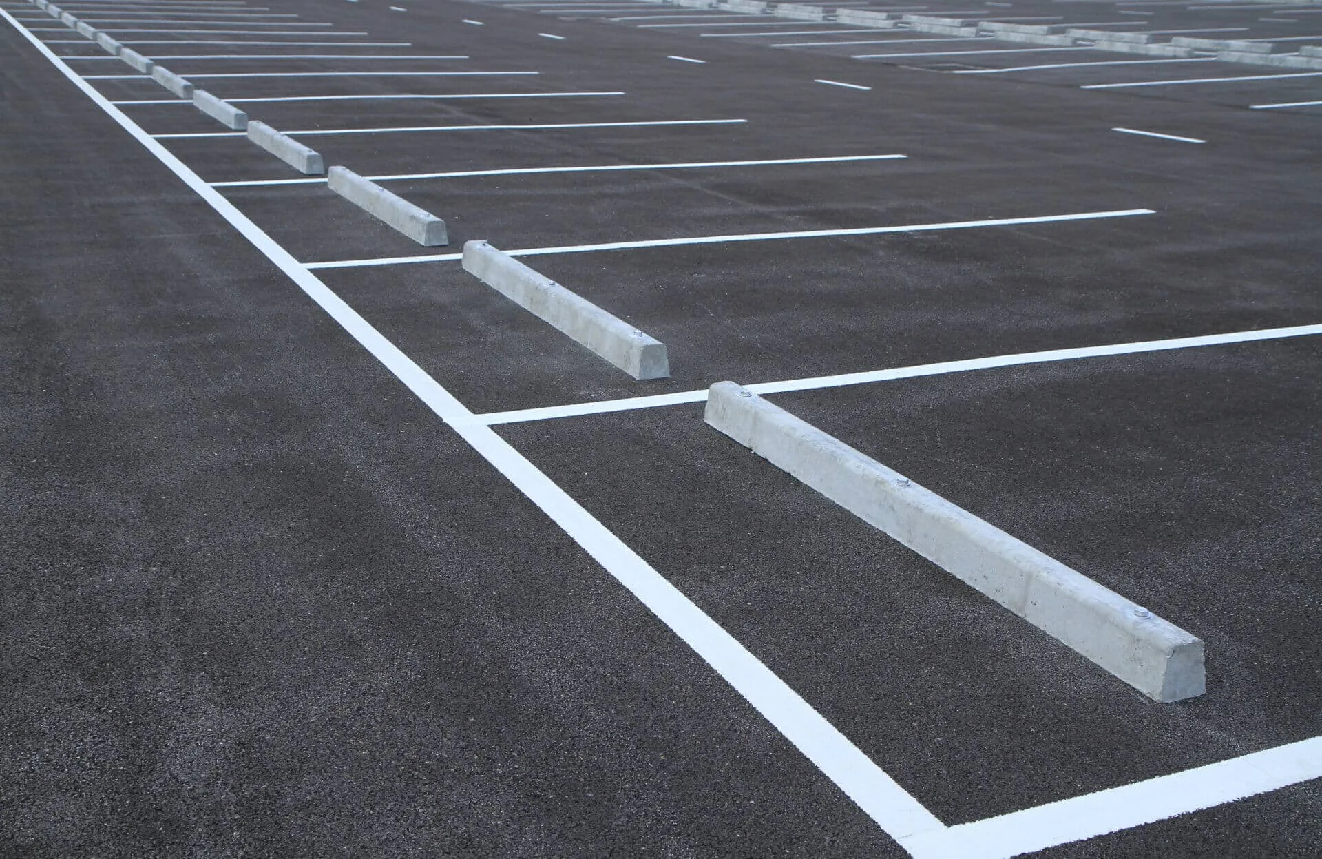 Read more about the article Why Parking Lot Maintenance Is Essential for Your Pavement’s Longevity and Safety