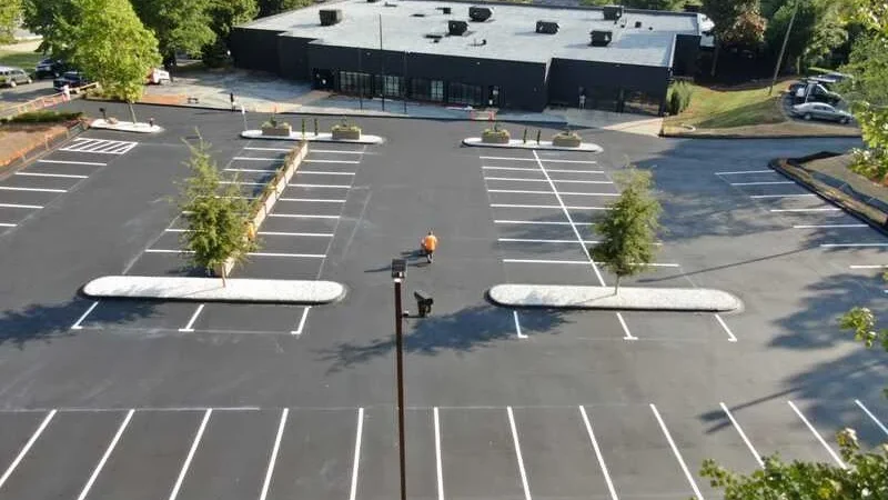 aerial view of freshly paved parking lot
