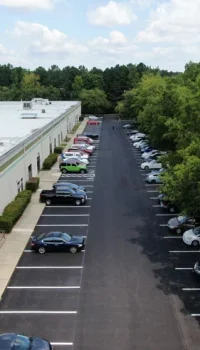 aerial view of a parking lot at a commercial facility