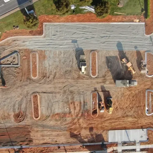 Aerial view of Turner Asphalt pouring concrete at commercial job site