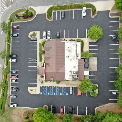 after asphalt repairs and sealcoating restaurant in woodstock, ga