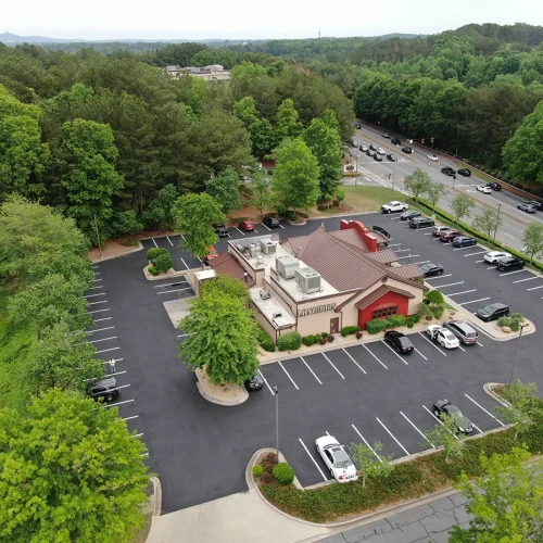 after asphalt repairs and sealcoating restaurant in woodstock, ga