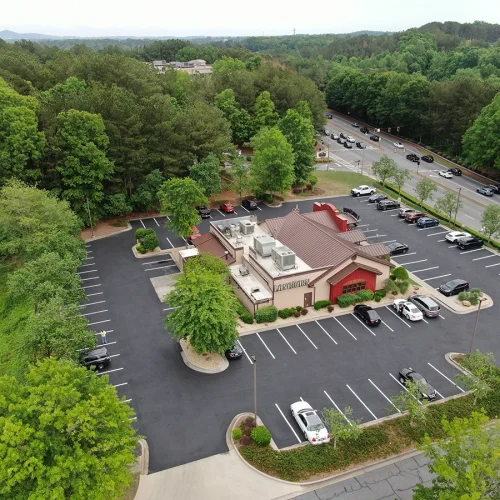 after asphalt repairs and sealcoating restaurant in woodstock, ga