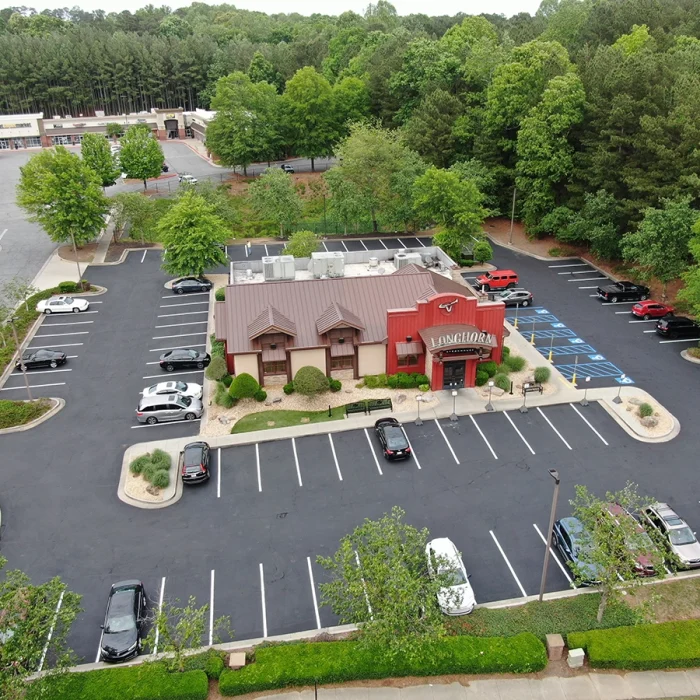 after asphalt repairs and sealcoating restaurant in woodstock, ga